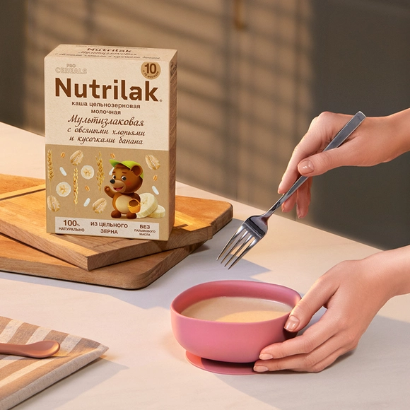 Детская каша молочная цельнозерновая Nutrilak мультизлаковая с овсяными хлопьями и кусочками банана